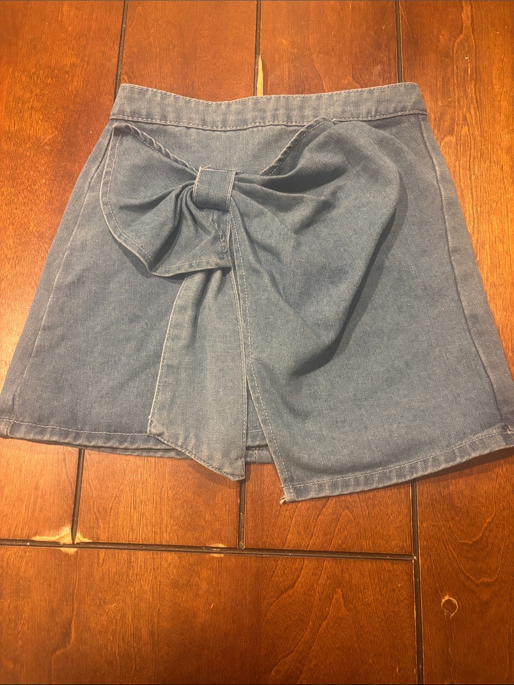Source Unknown Light Blue Denim Mini Skirt with Front Bow Accent
